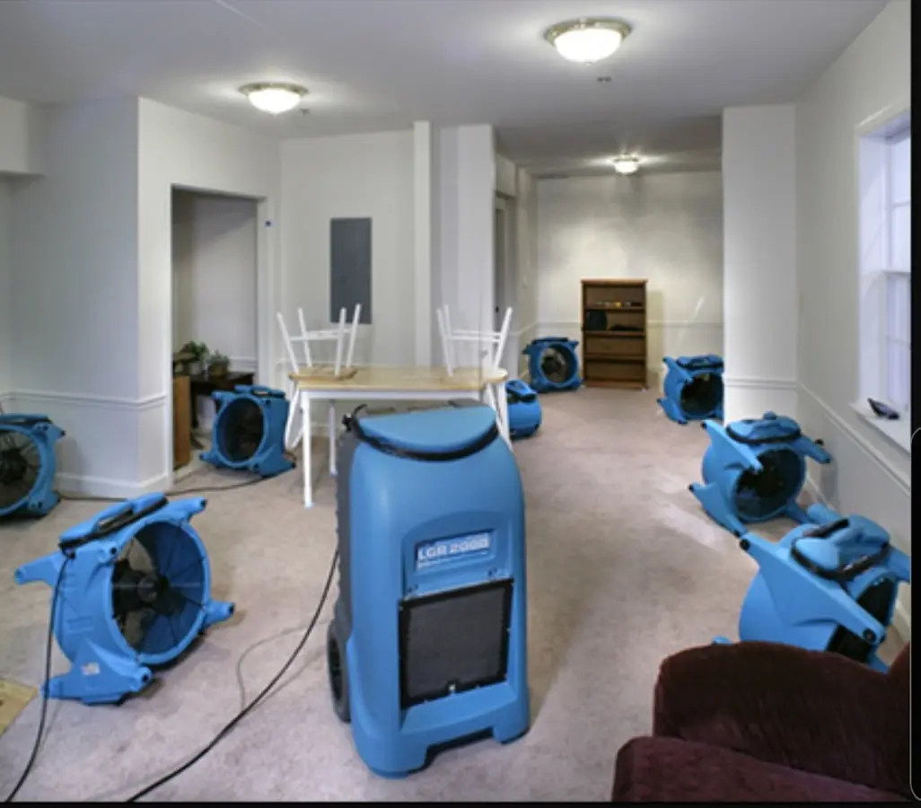 Air movers and dehumidifier setup for Water Damage Restoration in Sun Village
